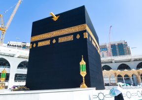 MECCA, SAUDI ARABIA , OCTOBER 22, 2020 – Pilgrims circle the Kaa MECCA, SAUDI ARABIA , OCTOBER 22, 2020 - Pilgrims circle the Kaaba in Masjid al-Haram - umrah Fewer Muslims people Socially Distanced corona virus wearing face mask